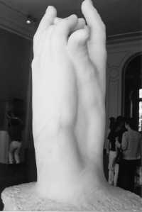 A marble sculpture found in the Musee Rodin entitled The Secret.