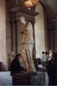 A marble sculpture found in the Louvre entitled Venus de Milo.